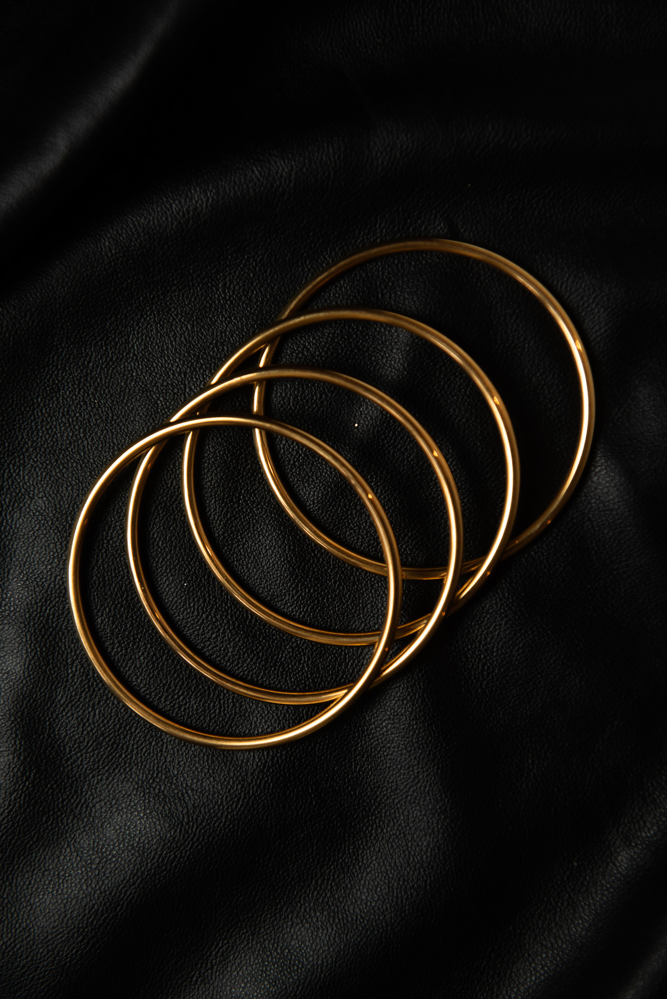 Set of Four Gold Thin Bangles